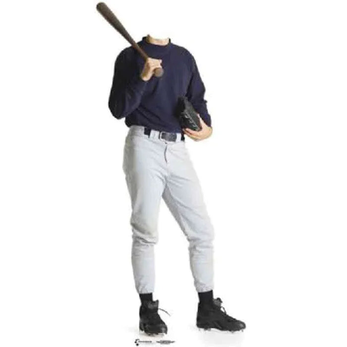 A cut out baseball player wearing a dark shirt, white pants, holding a baseball bat over one shoulder and a glove in the other hand.