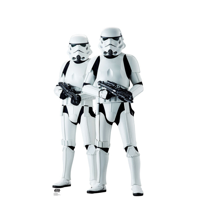 Life-size cardboard cutout of two Star Wars Stormtroopers standing side by side, dressed in white armor and holding blasters.