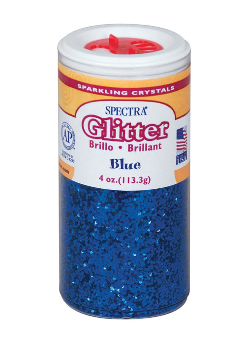 Container of Spectra Sparkling Crystals glitter in blue, 4 oz (113.3 g), with a red flip-top lid. The label features the Spectra brand name prominently in red glittery font, includes the word 'Glitter' with translations 'Brillo' and 'Brillant', and indicates the color as 'Blue'. It displays an AP seal for non-toxicity, a Made in USA emblem, and a bilingual layout in English, Spanish, and French.