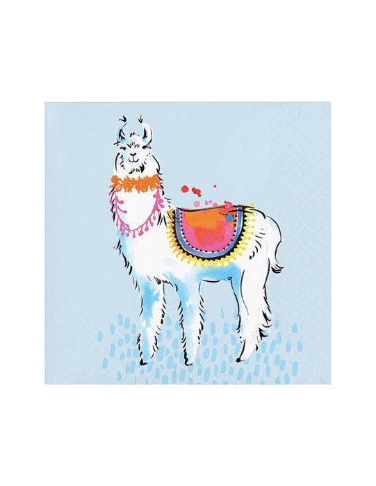 A light blue napkin featuring a colorful illustration of a llama. The llama is decorated with an orange and pink garland around its neck and has a brightly patterned saddle blanket in orange, pink, and yellow tones with blue shading on its legs.