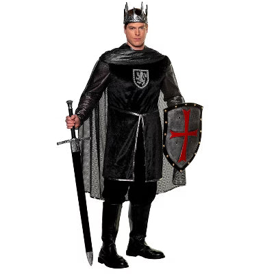 A man dressed in a medieval crusader knight costume featuring a white tunic with a red cross, chainmail-printed sleeves and hood, and a cape, resembling a warrior of the Templar order