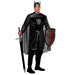 A man dressed in a medieval crusader knight costume featuring a white tunic with a red cross, chainmail-printed sleeves and hood, and a cape, resembling a warrior of the Templar order