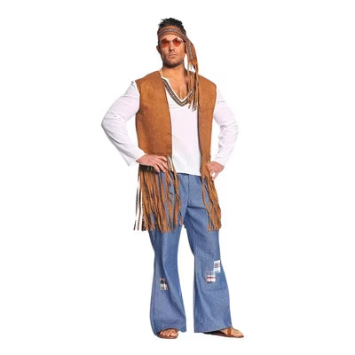 Man in a traditional cowboy costume wearing a white shirt, tan vest, brown fringed chaps over blue jeans, and a brown cowboy hat