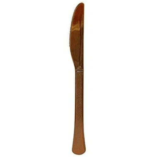 Single brown plastic knife displayed upright against a white background, showing its full length and slightly curved bowl.