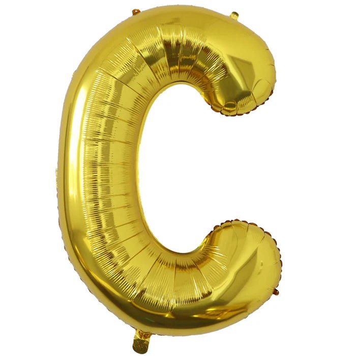 Gold foil balloon shaped like the letter C.