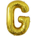 Gold foil balloon shaped like the letter G.