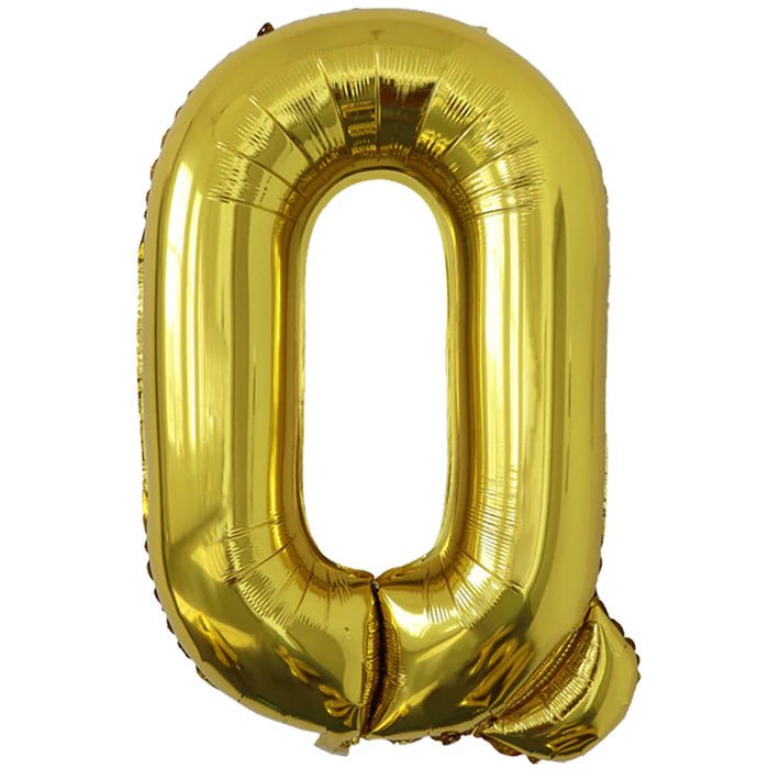 Gold foil balloon shaped like the letter Q.