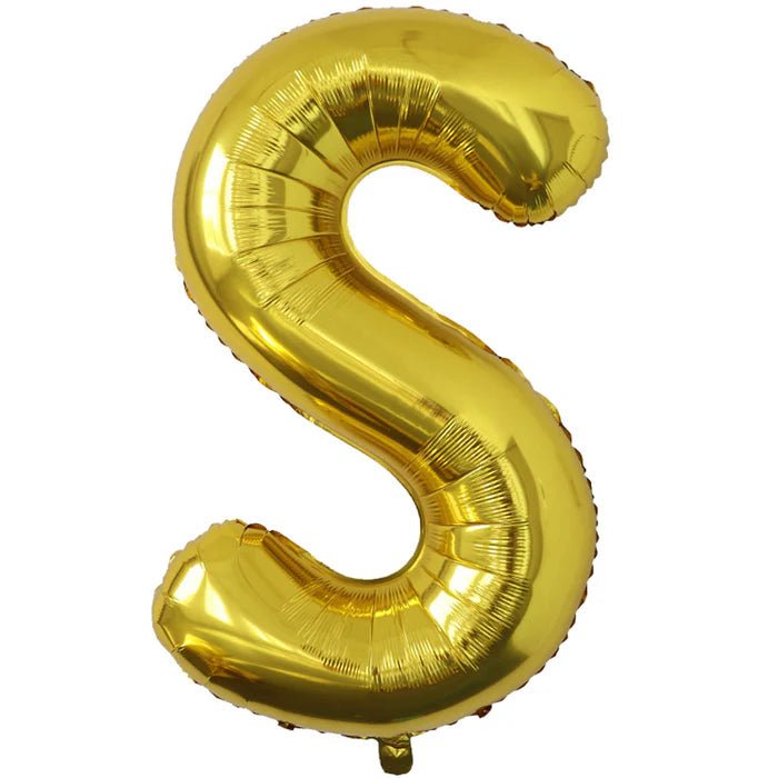 Gold foil balloon shaped like the letter S.