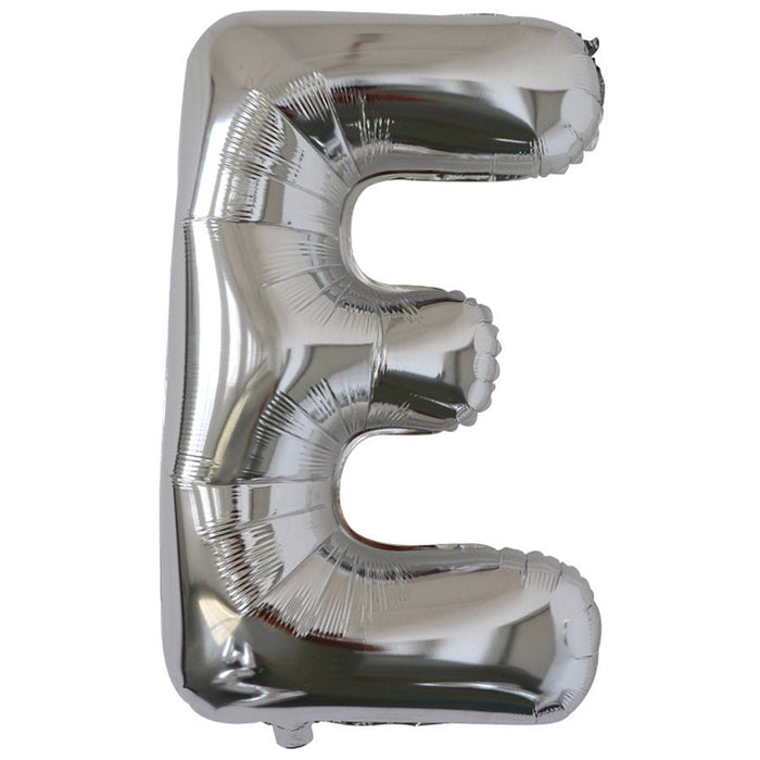 Silver foil balloon shaped like the letter E.