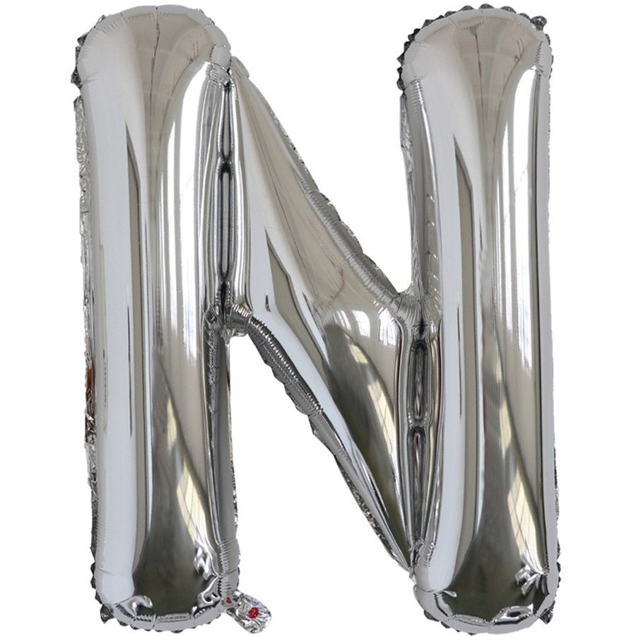 Silver foil balloon shaped like the letter N.