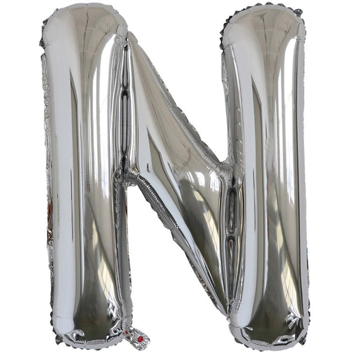 Silver foil balloon shaped like the letter N.