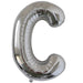 Silver foil balloon shaped like the letter C.