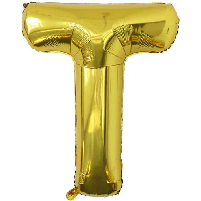 Gold foil balloon shaped like the letter T.