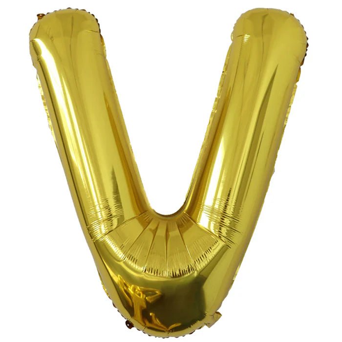 Gold foil balloon shaped like the letter V.