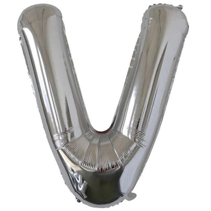 Silver foil balloon shaped like the letter V.