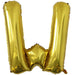 Gold foil balloon shaped like the letter W.