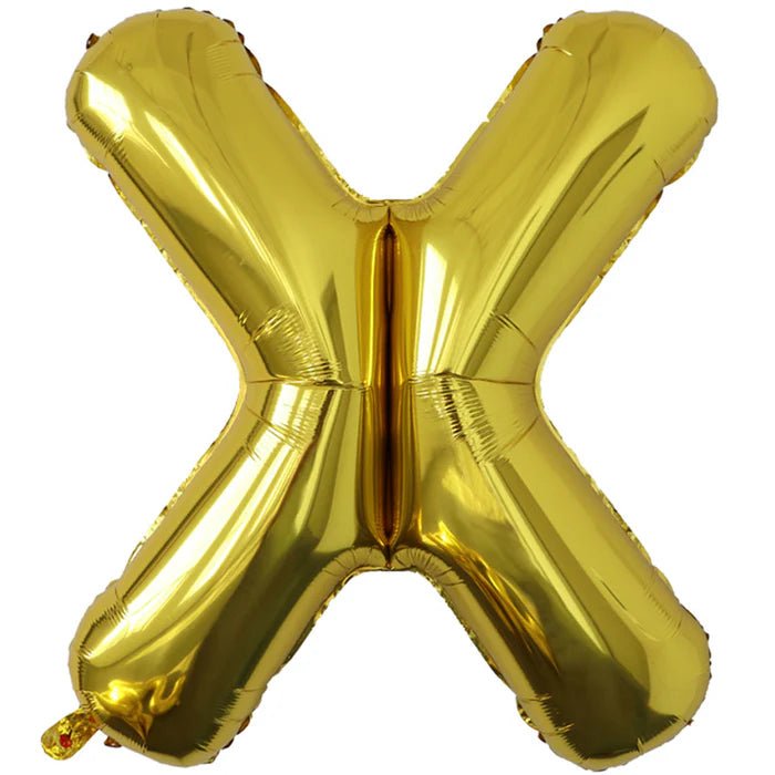 Gold foil balloon shaped like the letter X.
