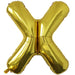 Gold foil balloon shaped like the letter X.