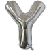 Silver foil balloon shaped like the letter Y.
