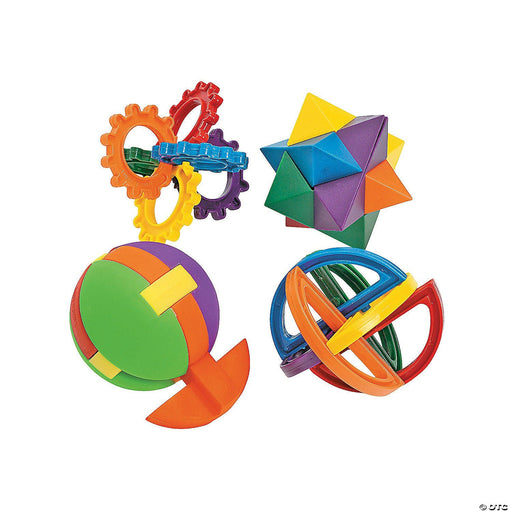 Set of brightly colored plastic puzzle balls and interlocking brain teaser toys. Each toy features bold hues such as red, yellow, orange, green, blue, and purple in geometric shapes including spheres, rings, and interlocking stars.