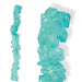 Blue rock candy sticks with large, jagged sugar crystals on wooden sticks, shown in both full and close-up views.