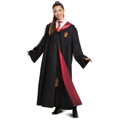  The Harry Potter Adult Deluxe Gryffindor Robe features a black robe with a Gryffindor Lion crest and red satin-lined hood and lapels.