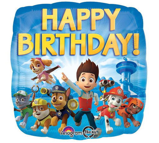 Square blue foil balloon featuring Paw Patrol characters with Ryder in the center, surrounded by Skye, Rubble, Chase, Marshall, Zuma, and Rocky, with large yellow 'Happy Birthday!' text at the top.