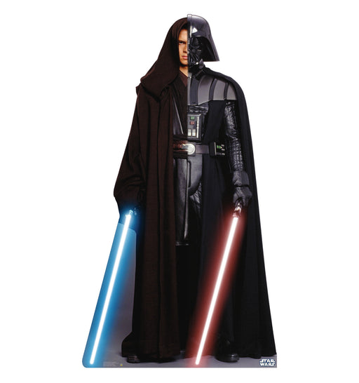 Life-size cardboard cutout of a character split down the middle, with one half as Anakin Skywalker holding a blue lightsaber and the other half as Darth Vader holding a red lightsaber, symbolizing the transformation from Jedi to Sith.
