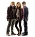 A life-size cutout of three young characters standing together: a red-haired boy in a plaid jacket, a girl with wavy hair in a scarf and boots, and a dark-haired boy in glasses holding a wand.