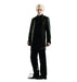 A life-size cutout of a young man with short blond hair wearing an all-black suit and holding a wand in his right hand.
