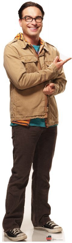 Life-size cardboard cutout of a man with glasses smiling and pointing to the side, wearing a tan jacket over a layered hoodie and shirt, dark pants, and black Converse sneakers.