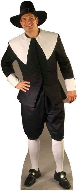 Cardboard cutout of a smiling man dressed in a traditional Pilgrim costume, featuring a black outfit with white collar and cuffs, white stockings, black shoes with buckles, and a black wide-brimmed hat.
