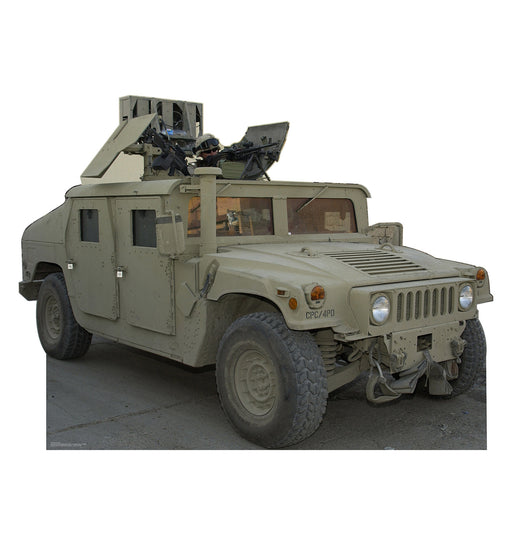 Tan military Humvee with reinforced armor and a mounted weapon system on the roof, featuring four doors, rugged tires, and angular body styling, shown parked on a paved surface.
