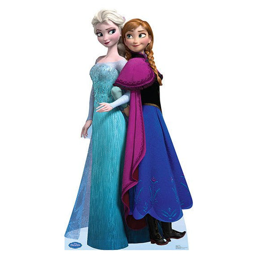 Life-size cutout of Elsa and Anna from Disney's Frozen standing back-to-back, Elsa in an icy blue gown with a sheer cape and Anna in a dark blue dress with a magenta cape.