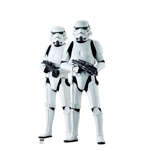 Life-size cardboard cutout of two Star Wars Stormtroopers standing side by side, dressed in white armor and holding blasters.