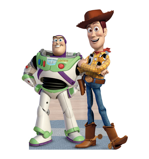 A life-size cutout of Buzz Lightyear in a white and green space suit standing next to Woody, who is wearing a cowboy hat, yellow plaid shirt, blue jeans, and brown boots.
