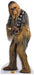 Life-size cardboard cutout of Chewbacca from Star Wars, covered in long shaggy fur that blends shades of dark brown, gray, and golden tan. He wears a bandolier with metallic squares and is holding his signature bowcaster weapon. The cutout stands on a white base featuring the yellow and red Star Wars logo.