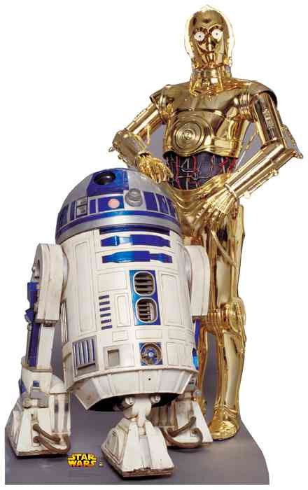 Life-size cardboard cutout featuring R2-D2 and C-3PO from Star Wars. R2-D2 is a white and blue astromech droid with a domed silver head, positioned slightly leaning forward. C-3PO stands behind him with a shiny gold humanoid frame, red wiring visible at his midsection, and his arms folded. Both are placed on a grey base with the yellow Star Wars logo.