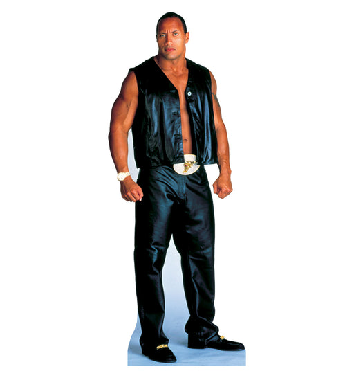 Life-size cardboard cutout of a muscular man wearing a sleeveless black leather vest, black leather pants, and black shoes, with a gold belt buckle and bracelet, standing confidently with clenched fists.