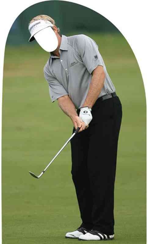 Cutout standee of a golfer mid-swing, wearing a white visor, light gray collared shirt, black pants, white golf glove, and white golf shoes with black stripes, holding a golf club over a grassy course.
