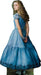 A young woman with long curly blonde hair wearing a light blue, floor-length dress with dark blue embroidery along the hem.