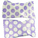 Two pieces of lavender candy with white polka dot wrappers, shown side by side with a gap in the middle where they have been separated.