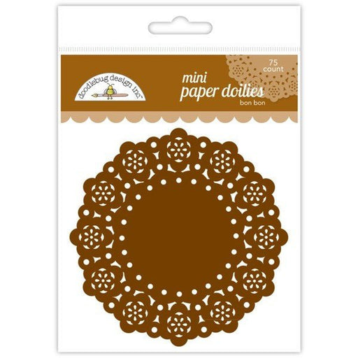Package of Doodlebug Design Inc. paper doilies in the 'bon bon' color, featuring 75 round brown doilies with intricate cut-out patterns.