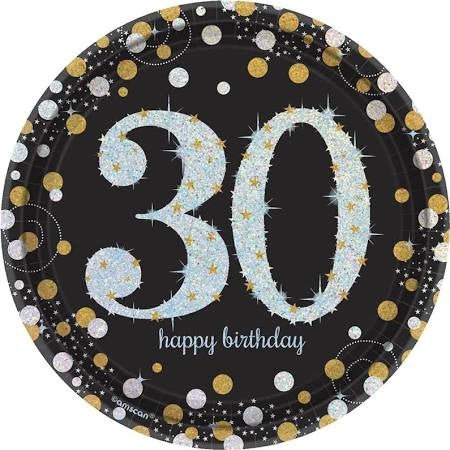 Black round plate with a large light blue glittery number '30' in the center, surrounded by gold, silver, and white confetti dots, with the words 'happy birthday' in lowercase script below the number.