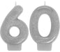 Two silver glitter number candles forming the number 60, each with a small wick at the top.