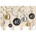 Black, gold, and silver hanging swirl decorations with large '40' cutouts and circular black cutouts featuring '40 happy birthday' in glittery white surrounded by gold and silver dots.