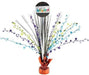 Retirement-themed balloon weight centerpiece with a round topper that reads 'Happy Retirement!' in colorful letters on a black background with multicolored confetti dots, featuring metallic sprays in silver, blue, green, and purple with star accents, wrapped at the base in shiny orange foil.