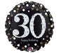 Round black foil balloon with large silver glitter-effect number '30' in the center, surrounded by gold and silver confetti dots, and the words 'happy birthday' in small white script below.