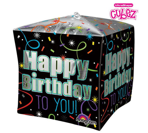 Black cube-shaped balloon with colorful confetti patterns and the text 'Happy Birthday TO YOU!' in large green and blue letters on multiple sides.