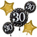 Arrangement of gold star-shaped balloons and black round balloons with white '30 happy birthday' text, decorated with white and gold dots.